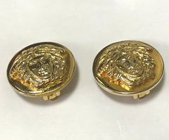Vintage Gianni Versace round gold tone medusa face motif earrings. Must have Lady Gaga style jewelry piece. Great gift. 060523re3