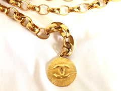Vintage CHANEL golden chain belt with large CC motif charm. Nice and heavy, rare and gorgeous accessory. 050323re3