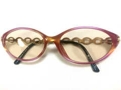 60's, 70's vintage Christian Dior pink and orange gradation sunglasses with golden chain temple. Unique and mod eyewear.