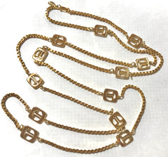 Vintage Lanvin golden chain long necklace with logo motif charms. Rare Lanvin vintage jewelry. Long necklace. 0403311