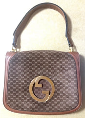 Vintage Gucci brown leather micro GG print shoulder bag with iconic golden large round GG motif. Rare masterpiece purse.