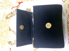Vintage Salvatore Ferragamo black leather shoulder mini bag with golden chain and Vara bow motif. Clutch purse from Vara collection. R041011