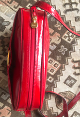 Vintage Salvatore Ferragamo vara collection patent enamel lipstick red shoulder bag with gold tone bow charm. Classic purse. 050407r3