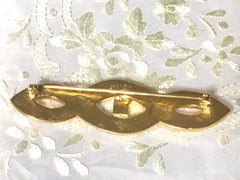 Vintage FENDI gold tone twisted design brooch pin, hat pin with FF mark. Can be used as a brooch pin, jacket brooch pin too. 0506303