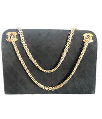 70's, 80's Vintage CHANEL genuine black suede leather kiss lock closure shoulder bag with gold tone CC marks and skinny chains. Rare purse.