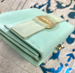 Vintage Salvatore Ferragamo blue lizard embossed leather wallet with gold tone vara motif. 05063012