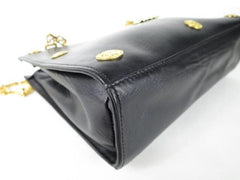 Reserved for Tammy. Vintage Gianni Versace black leather tote shoulder bag with big golden medusa motif and gold tone long chain straps. Too Gorgeous like Lady Gaga.