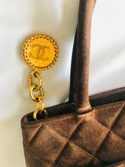 Vintage CHANEL brown suede classic tote bag with large CC mark and golden CC medal charm to the zipper. Classic purse for daily use.