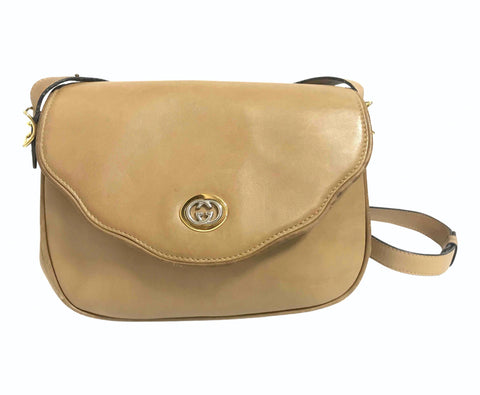 Vintage Gucci nude brown leather shoulder bag with golden and silver tone GG logo motif and wavy design flap. Classic purse. 060716r