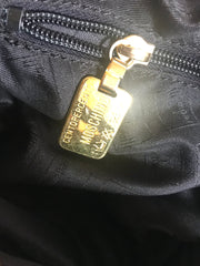 Vintage Moschino soft brown leather drum shape shoulder bag with iconic Question marks. Moschino by Redwall. Made in Italy. 060724r1 Moschino by Redwall. Made in Italy.