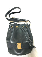 Vintage Salvatore Ferragamo black leather hobo style shoulder bag with vara logo motif and drawstrings. Classic bag for daily use. 050317r1