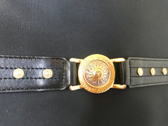 Vintage Gianni Versace large black nylon and leather combination tote bag with gold tone sunburst motifs and chains. 050425r4
