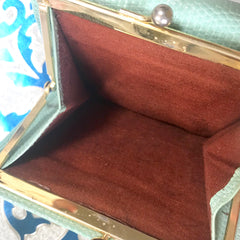Vintage Salvatore Ferragamo blue lizard embossed leather wallet with gold tone vara motif. 05063012
