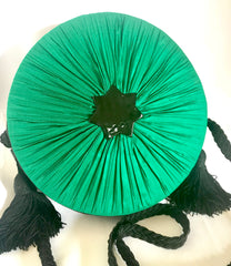 Vintage Nina Ricci black suede and green satin mix round shoulder bag with fringes and enamel star motif. Suzy Wong design. Collectible bag. 060616r3