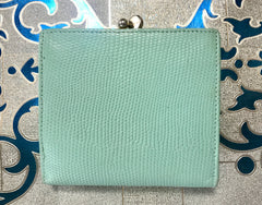 Vintage Salvatore Ferragamo blue lizard embossed leather wallet with gold tone vara motif. 05063012