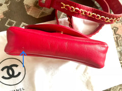 Vintage CHANEL red leather belt bag, fanny pack with detachable chain belt and CC stitch mark on flap.  Fits 29.5" through 32.8"