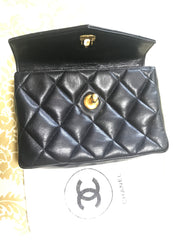 1980s. Vintage CHANEL black lamb leather belt bag, waist bag, fanny pack with golden chain belt & CC closure.  Belt size good for 23.8" through 26.2" (60.5-66.5cm)