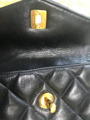 1980s. Vintage CHANEL black lamb leather belt bag, waist bag, fanny pack with golden chain belt & CC closure.  Belt size good for 23.8" through 26.2" (60.5-66.5cm)