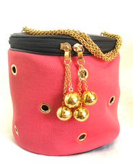 Vintage Moschino by Redwall lunchbox design red jersey and black leather handbag with golden eyelets and ball charms. 0506289