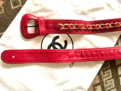 Vintage CHANEL red leather belt bag, fanny pack with detachable chain belt and CC stitch mark on flap.  Fits 29.5" through 32.8"