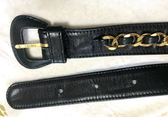1980s. Vintage CHANEL black lamb leather belt bag, waist bag, fanny pack with golden chain belt & CC closure.  Belt size good for 23.8" through 26.2" (60.5-66.5cm)