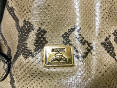 Vintage MOSCHINO by redwall snakeskin print leather mini backpack with golden M logo charm. Perfect chic and mod daily bag. 070131re1