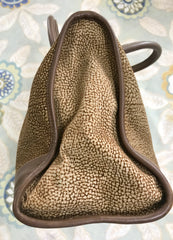 Vintage Borbonese by red wall, brown and beige leather classic bag with golden logo charm.  Unisex use. Masterpiece.