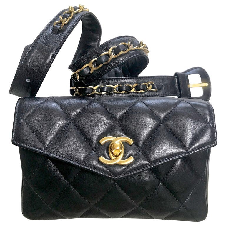 1980s. Vintage CHANEL black lamb leather belt bag, waist bag, fanny pack with golden chain belt & CC closure.  Belt size good for 23.8" through 26.2" (60.5-66.5cm)