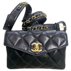 1980s. Vintage CHANEL black lamb leather belt bag, waist bag, fanny pack with golden chain belt & CC closure.  Belt size good for 23.8" through 26.2" (60.5-66.5cm)