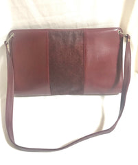 Vintage Christian Dior wine red leather clutch shoulder bag with engraved logo at center. Classic and beautiful purse. 060905r4