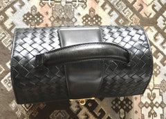 1990s. Vintage Bottega Veneta classic black lamb leather intrecciato handbag with golden closure hock. Gorgeous masterpiece from Bottega.