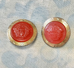 Vintage Gianni Versace orange candy earrings with gold tone frames and Medusa face. Rare jewelry piece. 0407283