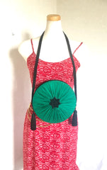 Vintage Nina Ricci black suede and green satin mix round shoulder bag with fringes and enamel star motif. Suzy Wong design. Collectible bag. 060616r3