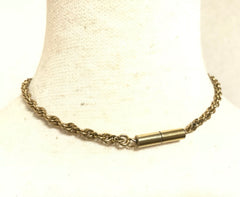 Vintage Celine gold tone crescent moon shape necklace with silver triomphe logo. 05062810