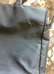 Vintage Gianni Versace large black nylon and leather combination tote bag with gold tone sunburst motifs and chains. 050425r4