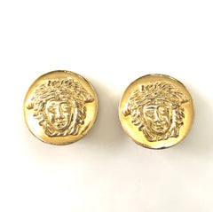 Vintage Gianni Versace round gold tone medusa face motif earrings. Must have Lady Gaga style jewelry piece. Great gift. 060523re3