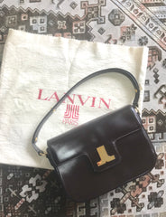 Vintage Lanvin dark brown leather elegant shoulder bag with iconic golden logo motif, Classic purse for daily use. 060620r1