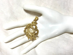 MINT. Vintage Yves Saint Laurent golden arabesque design pendant top. YSL leaf design top. Enjoy it with your own necklace. 061105re4