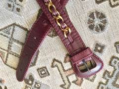 Vintage CHANEL wine fanny pack, leather belt bag with detachable chain belt and CC stitch mark on flap.  Fits 29.5" -32.6" 070502re2