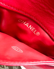 Vintage CHANEL red leather belt bag, fanny pack with detachable chain belt and CC stitch mark on flap.  Fits 29.5" through 32.8"
