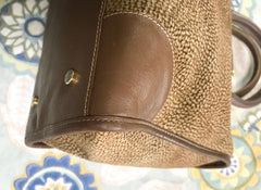 Vintage Borbonese by red wall, brown and beige leather classic bag with golden logo charm.  Unisex use. Masterpiece.