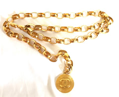Vintage CHANEL golden chain belt with large CC motif charm. Nice and heavy, rare and gorgeous accessory. 050323re3