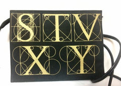 Vintage Paloma Picasso black canvas and leather combo shoulder bag with golden A B C D E F and S T V X Y letter print.