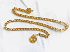 MINT. Vintage CHANEL flat golden chain belt with CC motif charms. Classic vintage accessory piece for daily use. 060523re4