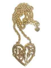 Vintage Moschino golden chain necklace with large arabesque heart design pendant top. Moschino BIJOUX jewelry.