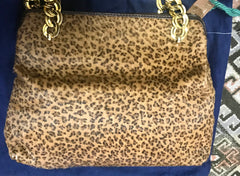 Vintage Bottega Veneta genuine leather shoulder bag with allover faux leopard print and double golden chain straps.