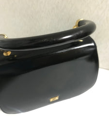 Vintage MOSCHINO black patent enamel Kelly style handbag with M logo and heart motifs. Masterpiece by Redwall. 050323re4