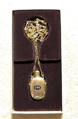 Vintage Gucci golden perfume bottle necklace with logo mark on top. Gorgeous rare masterpiece from 80's. 0410271