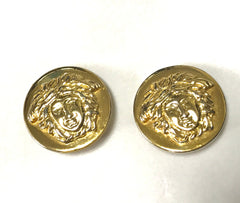 Vintage Gianni Versace round gold tone medusa face motif earrings. Must have Lady Gaga style jewelry piece. Great gift. 060523re3