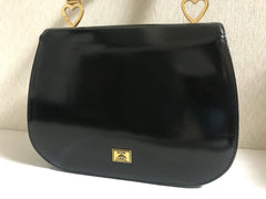 Vintage MOSCHINO black patent enamel Kelly style handbag with M logo and heart motifs. Masterpiece by Redwall. 050323re4